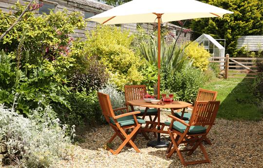 Sunny enclosed patio area off front entrance