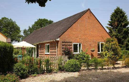 Gravel driveway with off-road parking