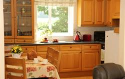 Well equipped kitchen with dining table for 4