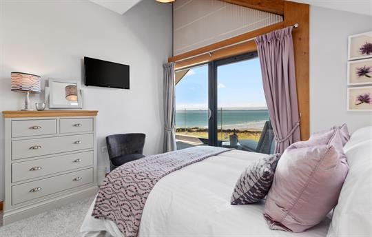 Luxurious King size bed.