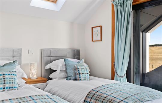 Twin bedroom with views