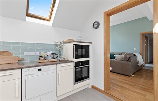 Single step down to kitchen