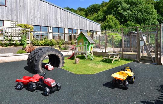 Toddler 'race track' and walk-in rabbit area
