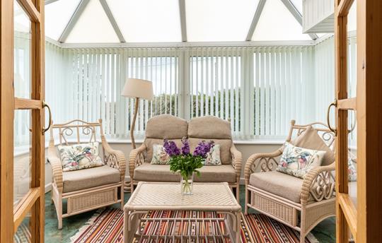 Ground floor bedroom with conservatory