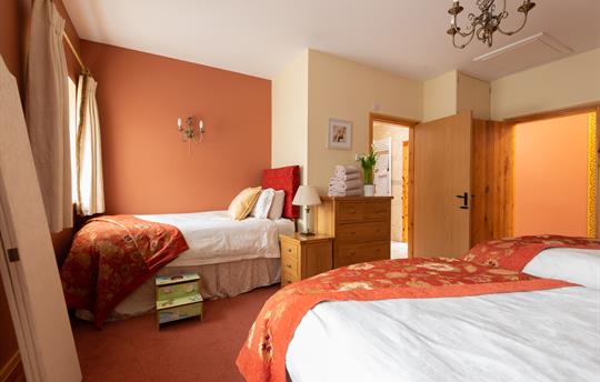 Extra single bed in the family room