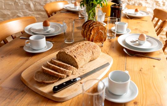 Large pine table can seat up to ten