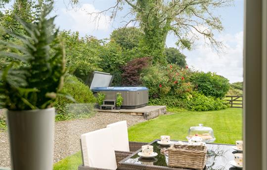 View of the hot tub and seating area