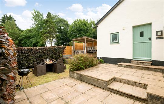 Outside area with seating, barbecue and Hot Tub