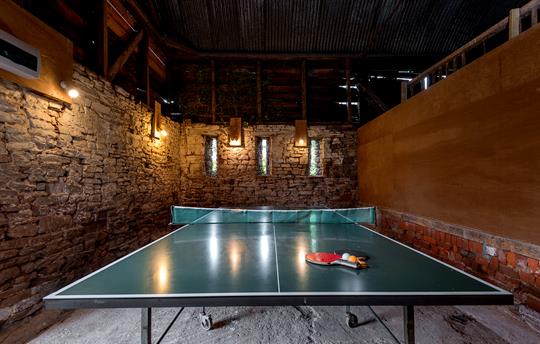 Rustic table tennis room in the outbuildings