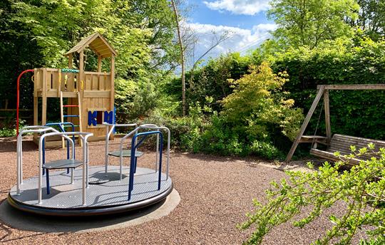 Garden play equipment and all weather surface