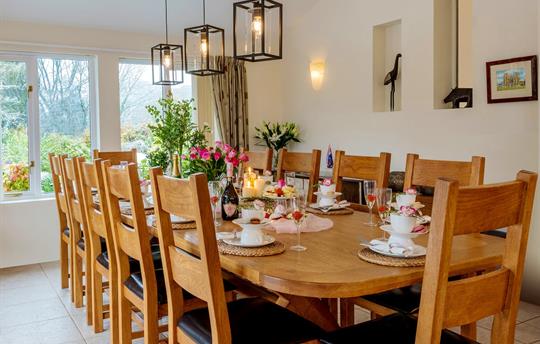 Dining room with large oak table.