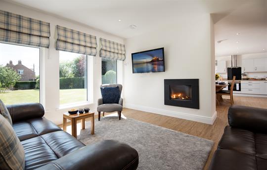 Sitting room with cosy fire
