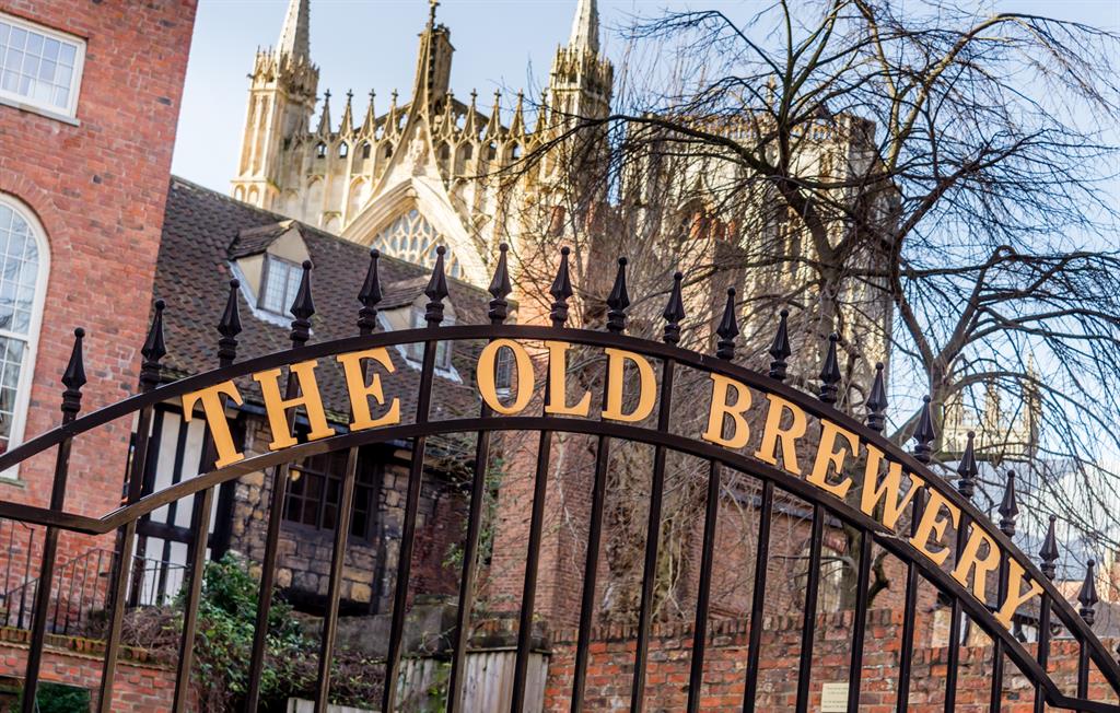 External view of York Old Brewery and York Minster