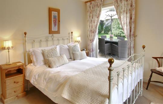 King-size bedroom with door to the patio