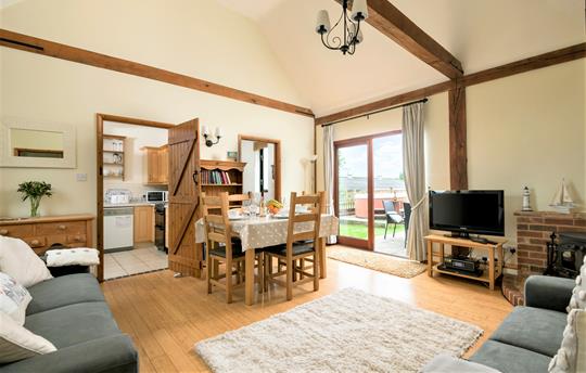 Spacious & airy living space leading to the garden