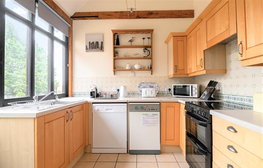 Bright and airy kitchen overlooking the courtyard