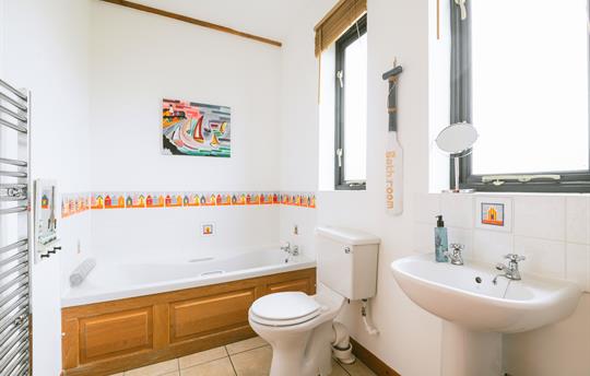 Bright and fun family bathroom on ground floor 