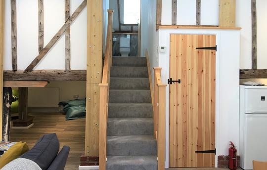 Small stairway to first floor from the main living