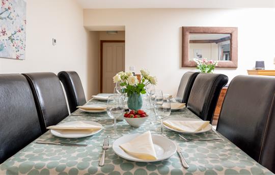 The Courtyard dining table sits 8 people