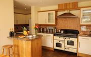 Well equipped open plan kitchen