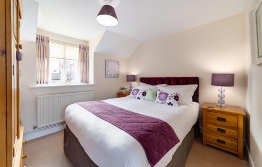 Harewood second bedroom with king size bed