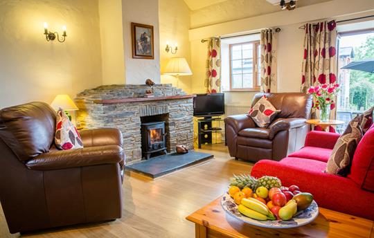 The Dairy lounge with log burner