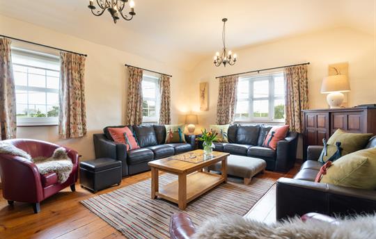 Croft House sitting room with log burner