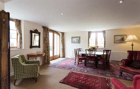 Stables dining room with wood burner