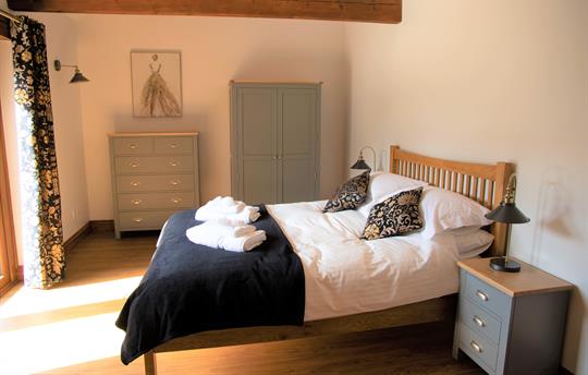 Courtyard bedroom with French doors