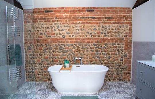 En suite with separate shower to master bedroom