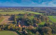 Sparham Hall Farm Cottages and the Wensum Valley.