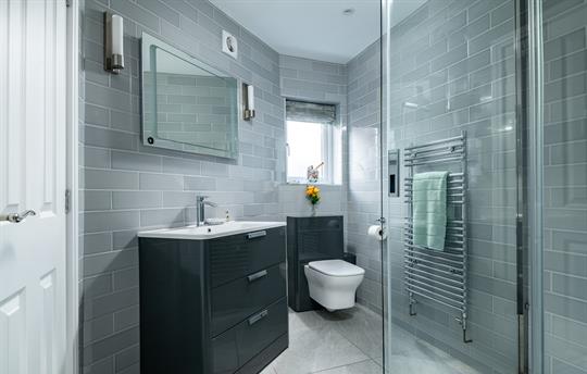 Downstairs bathroom at the end of the hall