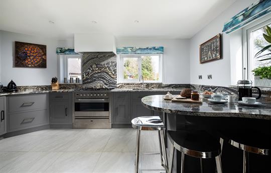 Kitchen area with breakfast bar