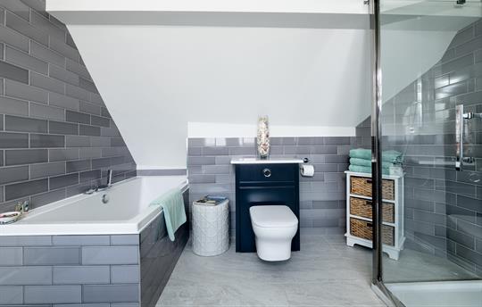 En suite bathroom with separate shower