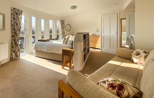 Spacious bedroom with fantastic views.