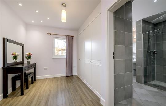 Ground floor dressing area with wet room