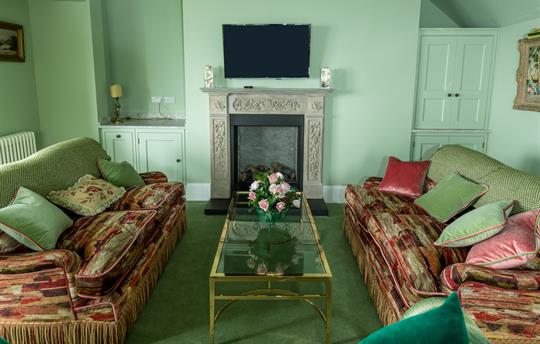 Lounge upstairs with fire place