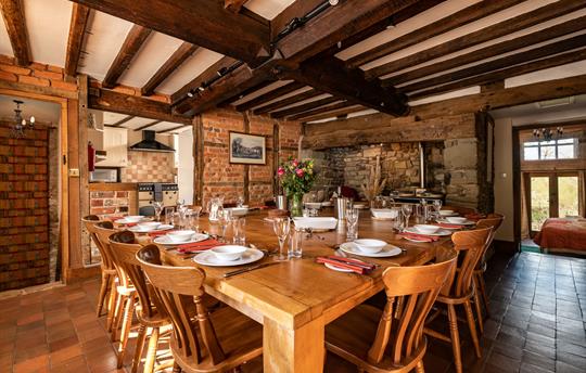 Dining room with handmade oak table seating 18