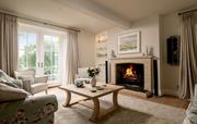 A cosy fire in the Drawing Room of Somerset Soul