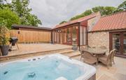 Hot Tub and Enclosed Garden at Dalby Cottage