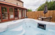 Garden and Hot Tub at Cropton Cottage