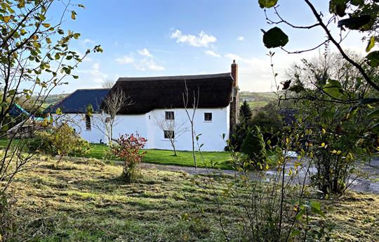 Luckett Farmhouse and Keepers Lodge (left)