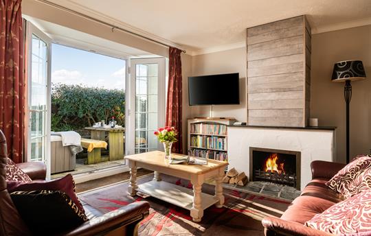 South facing open plan living room with open fire