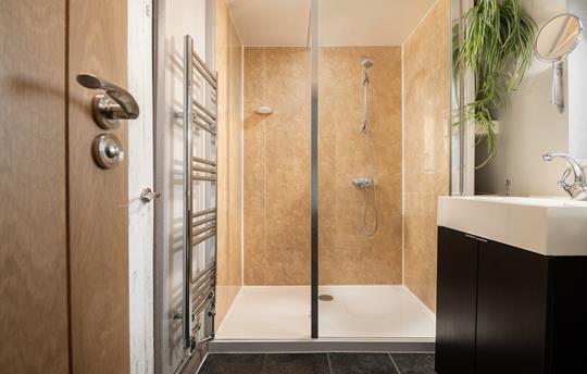 Spacious bathroom with large walk in shower