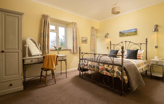 Light and airy second floor kingsize bedroom