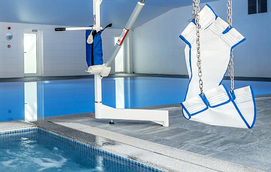 White sling-style accessible hoist seat