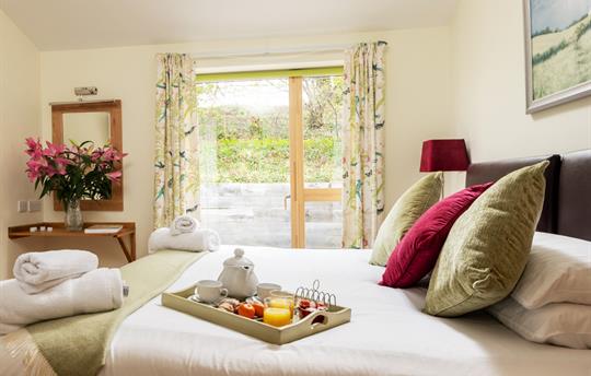 Patio view through Silver Birch bedroom patio door