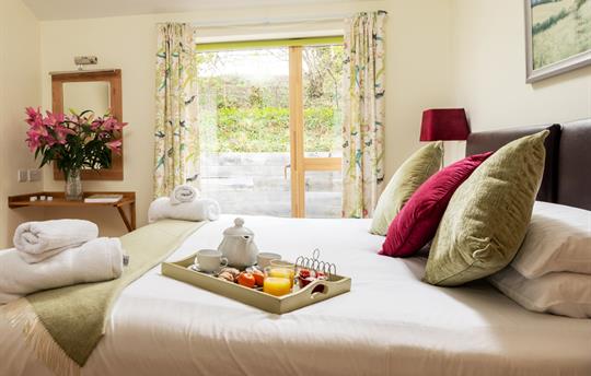 Patio view through Silver Birch bedroom patio door