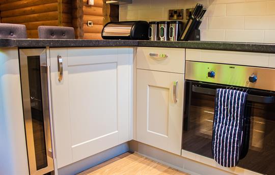 Fully fitted kitchen with wine fridge