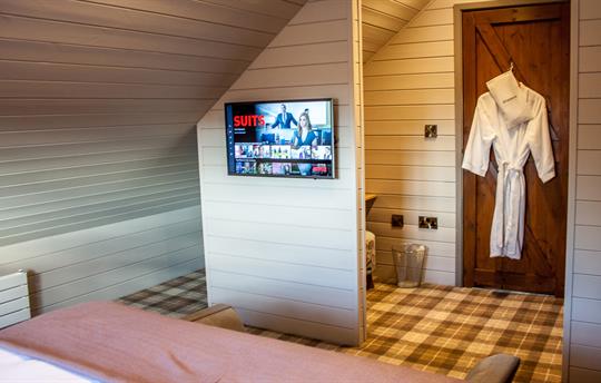 Main bedroom with Smart TV and dressing area